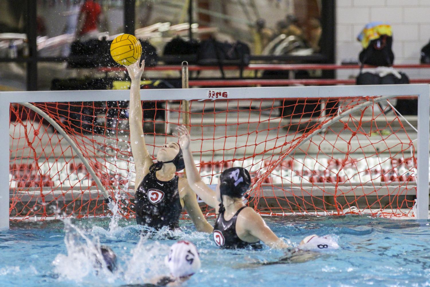 <a href='http://atvc.braendebriketter.com'>全球十大赌钱排行app</a> student athletes compete in a water polo tournament on campus.